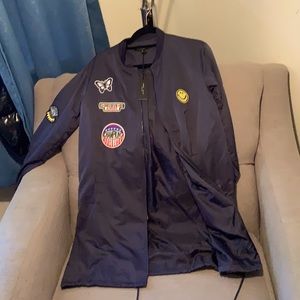 A navy blue flight jacket